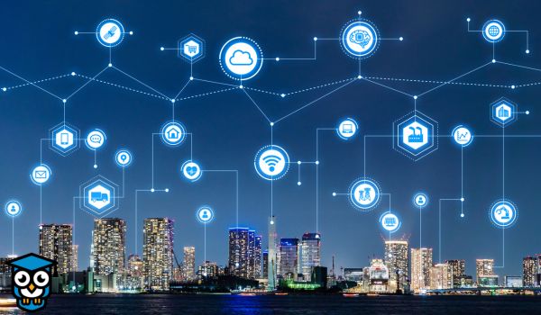 A digital network diagram overlaid on a night skyline of a city. Glowing icons representing cloud computing, wifi, factories, and people are connected by dotted white lines.